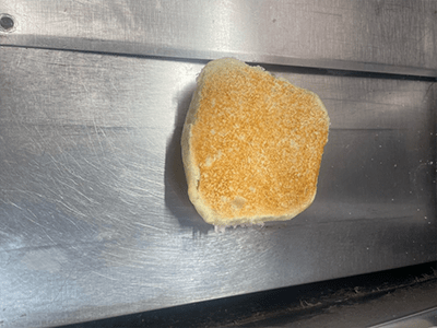 testing several hamburger buns through the Toaster