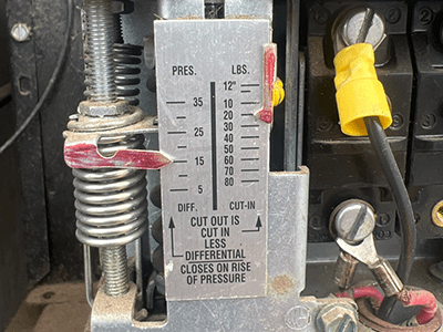 Forced compressor on by adjusting cut in to vacuum pressures