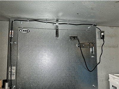 installed layover freezer door and frame